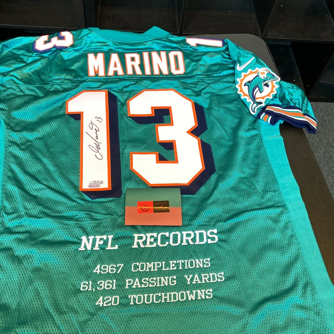Dan Marino UDA Signed Miami Dolphins Nike Authentic Jersey 1 of 500: Dan Marino UDA Signed Miami Dolphins Nike Authentic Jersey 1 of 500 This is a Dan Marino autographed authentic Miami Dolphins game model jersey. The jersey is a Nike authentic edition, part of a limit