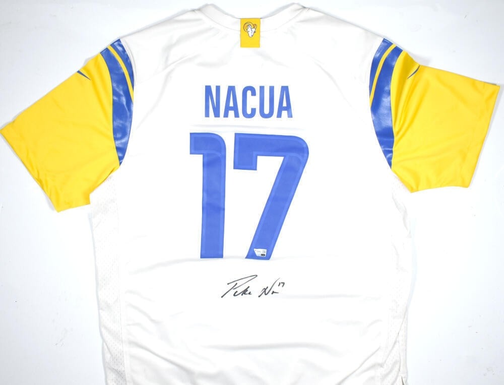Signed Nike Rams White Game Jersey Puka Nacua Fanatics Authentic: Signed Nike Rams White Game Jersey Puka Nacua Fanatics Authentic Autographed Los Angeles Rams white Nike game jersey featuring Puka Nacua. The jersey is described as original, signed, and pre-owned. I