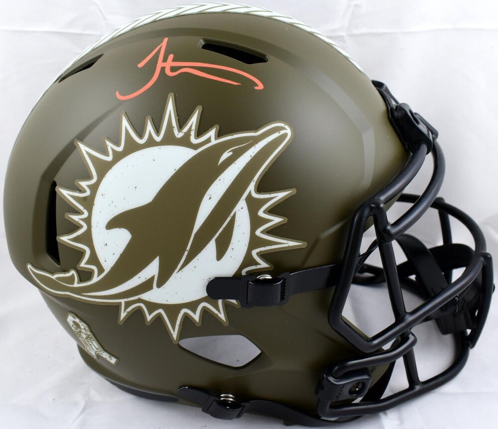 Tyreek Hill autographed Miami Dolphins full size Speed helmet Beckett holo: Tyreek Hill autographed Miami Dolphins full size Speed helmet Beckett holo This is an original Miami Dolphins full-size Salute to Service speed helmet signed by Tyreek Hill. The helmet is pre-owned an