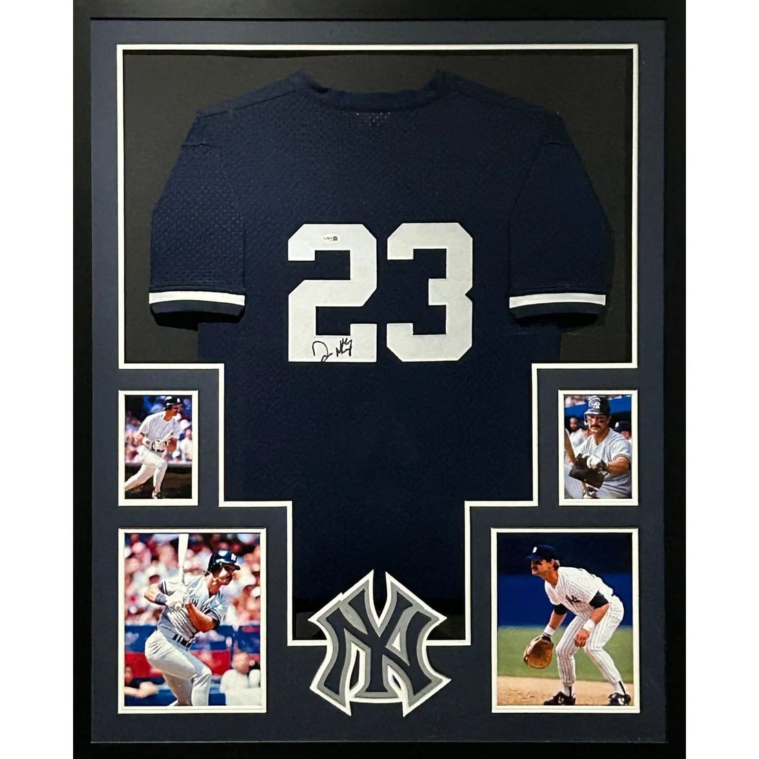 Framed Don Mattingly Yankees Navy Autographed Jersey PSA DNA: Framed Don Mattingly Yankees Navy Autographed Jersey PSA DNA This framed navy jersey is autographed by Don Mattingly and features the New York Yankees logo. The jersey is professionally framed with UV