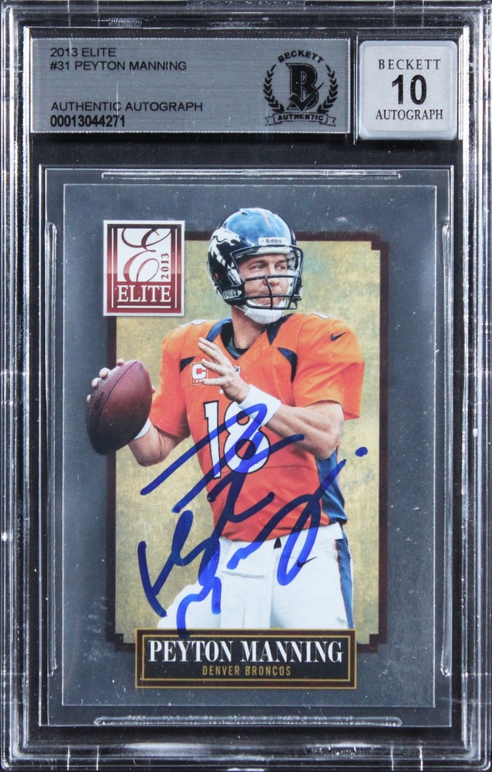Peyton Manning 2013 Elite #31 Broncos autographed BAS slabbed card: Peyton Manning 2013 Elite #31 Broncos autographed BAS slabbed card This 2013 Elite #31 football card features Peyton Manning of the Denver Broncos and has been personally signed by him. The card has r