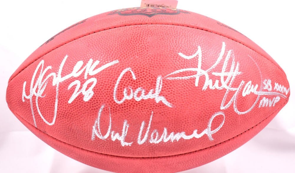 Wilson Duke football signed by Faulk Warner Vermeil Beckett holo: Wilson Duke football signed by Faulk Warner Vermeil Beckett holo Autographed Wilson Duke football featuring signatures from Marshall Faulk, Kurt Warner, and Dick Vermeil. It is an original item associ