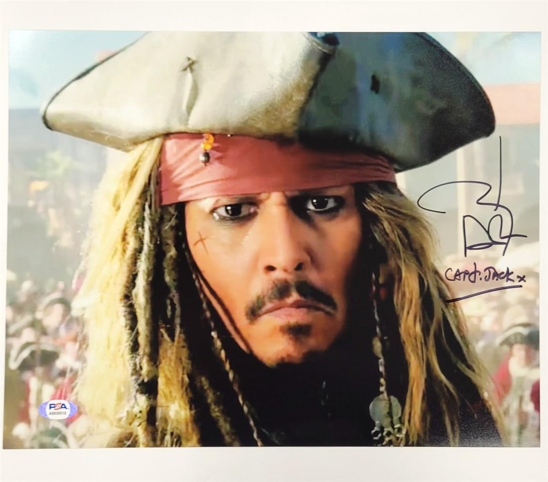 Pirates of the Caribbean 16x20 Photo Johnny Depp Autographed PSA/DNA Certified: Pirates of the Caribbean 16x20 Photo Johnny Depp Autographed PSA/DNA Certified This original photograph from Pirates of the Caribbean features a signature by Johnny Depp as Captain Jack. The autograph
