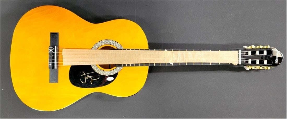 Acoustic Guitar Signed by Jean-Michel Jarre JSA Authenticated: Acoustic Guitar Signed by Jean-Michel Jarre JSA Authenticated This pre-owned acoustic guitar is signed by renowned French composer Jean-Michel Jarre. The autograph has been authenticated by James Spen