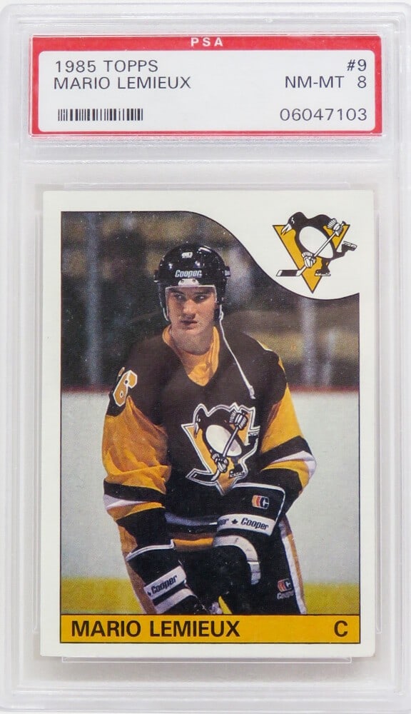 Mario Lemieux 1985 Topps RC #9 Graded NM-MT 8 PSA Pittsburgh Penguins: Mario Lemieux 1985 Topps RC #9 Graded NM-MT 8 PSA Pittsburgh Penguins This is a Mario Lemieux Pittsburgh Penguins 1985 Topps rookie trading card #9, encapsulated and graded Near Mint-Mint (NM-MT) 8 by