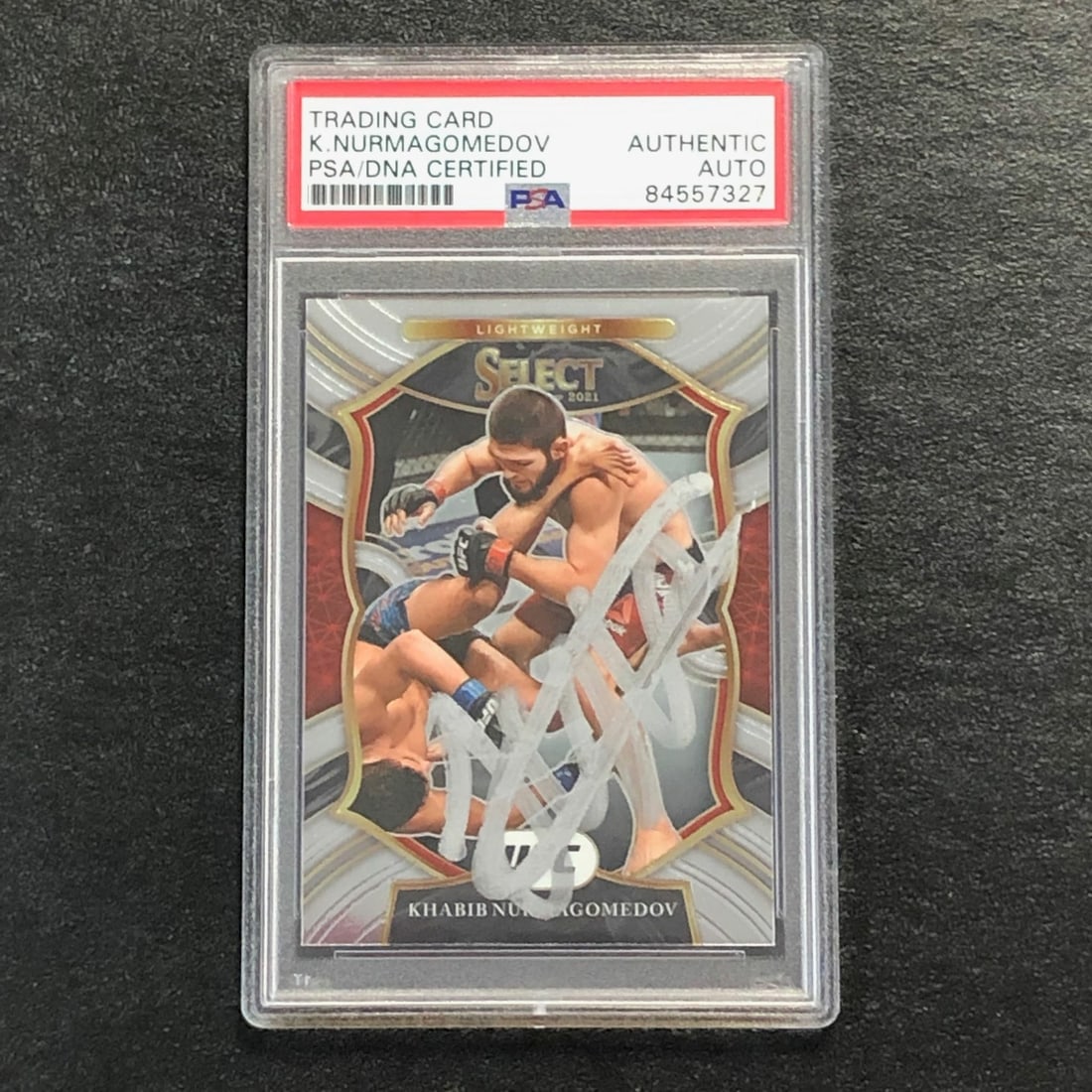 PSA Auth Khabib Nurmagomedov Panini Select UFC Card #47: PSA Auth Khabib Nurmagomedov Panini Select UFC Card #47 This is a 2021 Panini Select #47 sports trading card featuring Khabib Nurmagomedov from the Ultimate Fighting Championship (UFC). The card has b