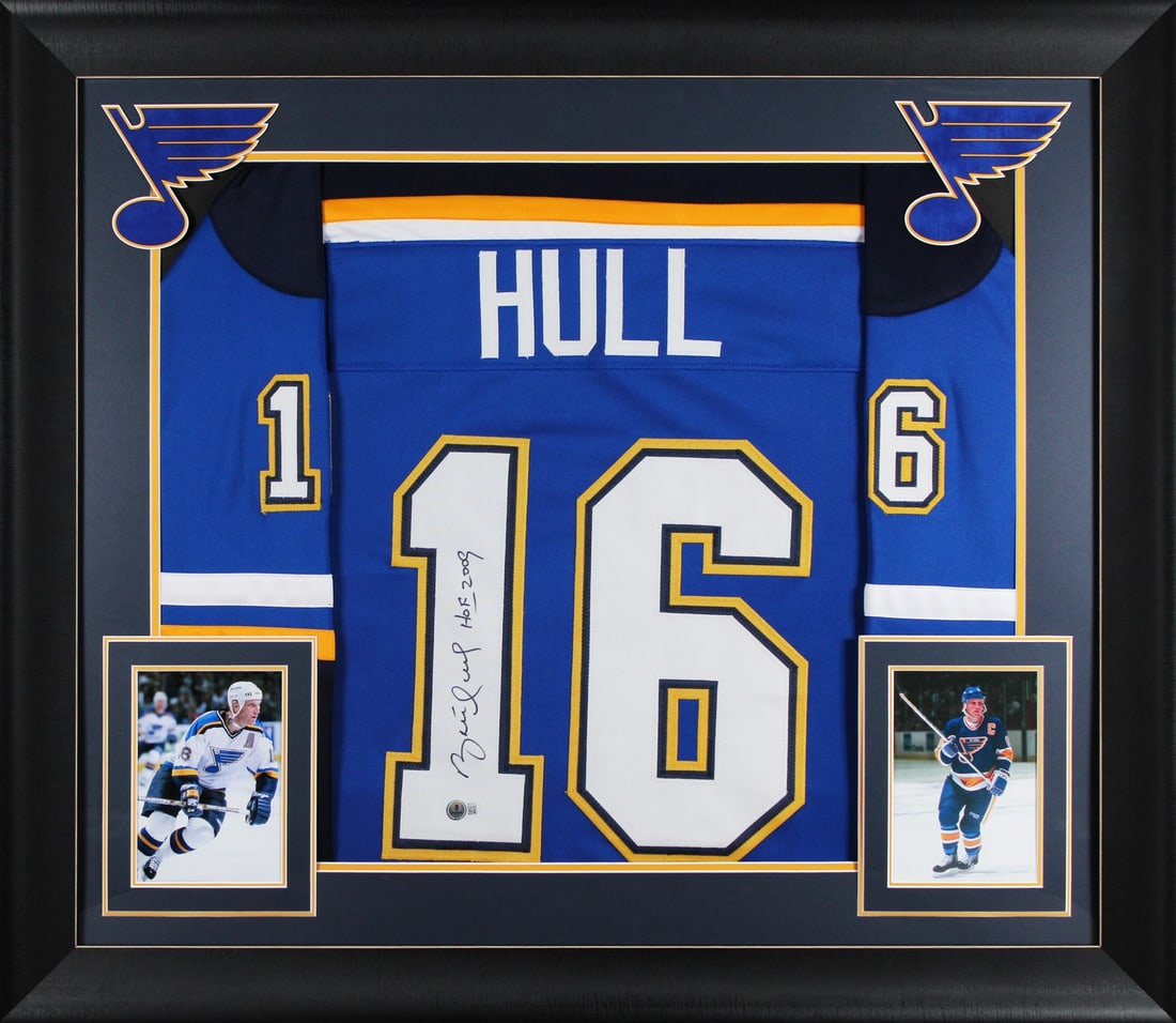 Brett Hull Signed Blue Framed Jersey HOF 2009 BAS Certified: Brett Hull Signed Blue Framed Jersey HOF 2009 BAS Certified Celebrate the legacy of hockey legend Brett Hull with this authentic signed blue pro style framed jersey, featuring the inscription "HOF 200