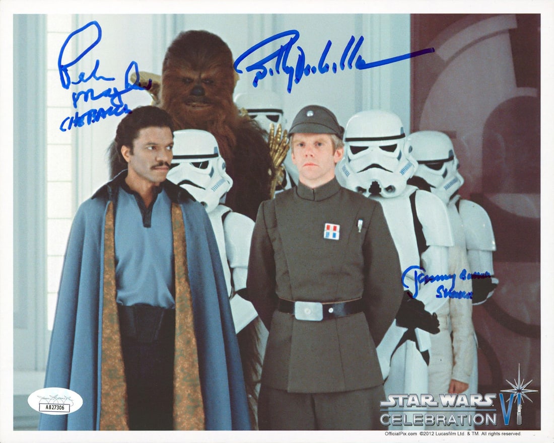 8x10 Official Pix Photo Signed by Bulloch Williams Mayhew JSA Authenticated: 8x10 Official Pix Photo Signed by Bulloch Williams Mayhew JSA Authenticated This 8x10 inch horizontal photograph from Official Pix features original autographs by Jeremy Bulloch, Billy Dee Williams, a