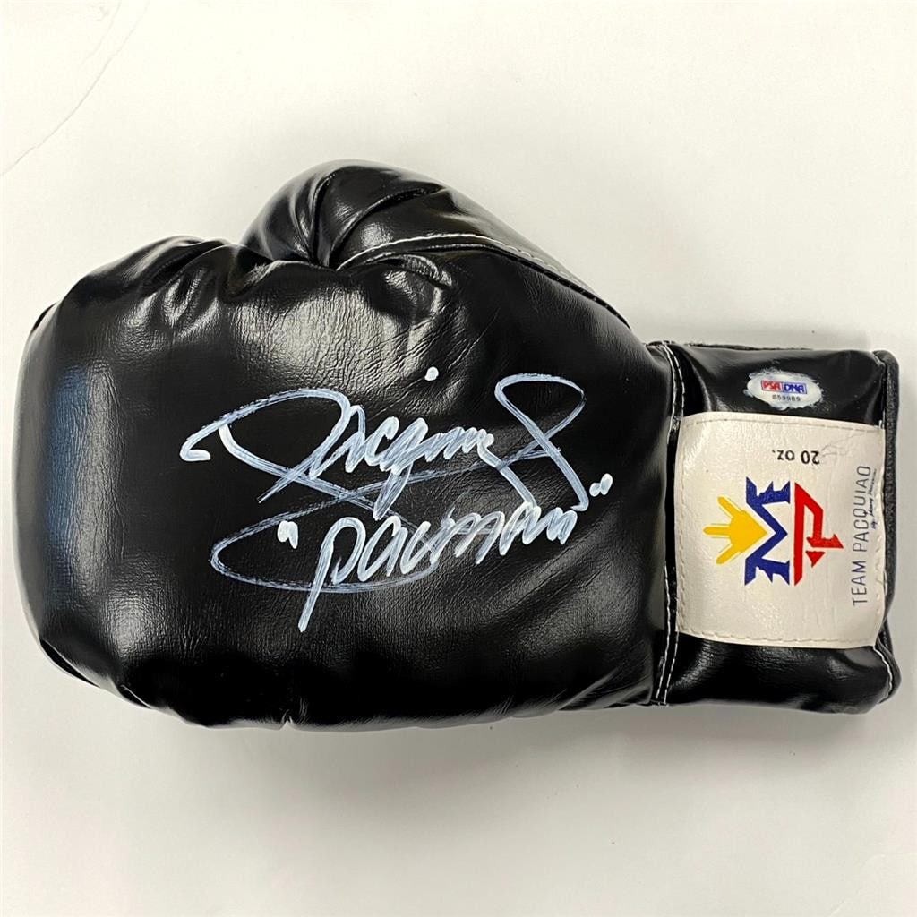 Manny Pacquiao Autographed Team Pacquiao Boxing Glove PSA: Manny Pacquiao Autographed Team Pacquiao Boxing Glove PSA This pre-owned Team Pacquiao boxing glove features the autograph of Manny Pacquiao, also known as "Pacman." The signature has been authenticat