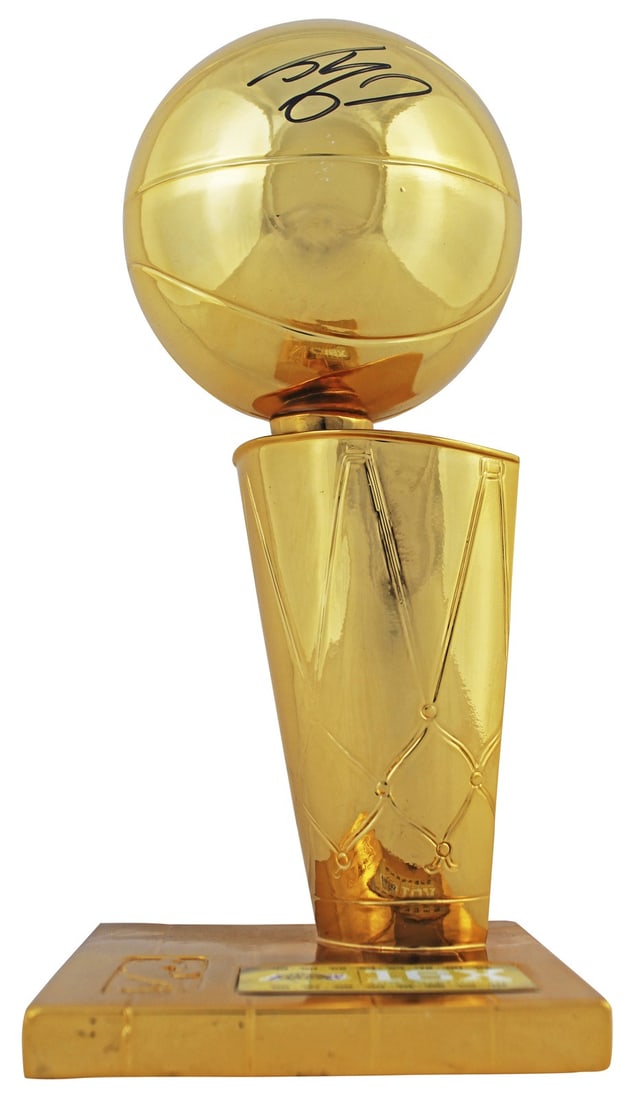 Shaquille O'Neal Autographed 12 Inch NBA Trophy Replica Beckett Authenticated: Shaquille O'Neal Autographed 12 Inch NBA Trophy Replica Beckett Authenticated This 12-inch replica Larry O'Brien Trophy features a hand-signed autograph from Shaquille O'Neal of the Los Angeles Lakers
