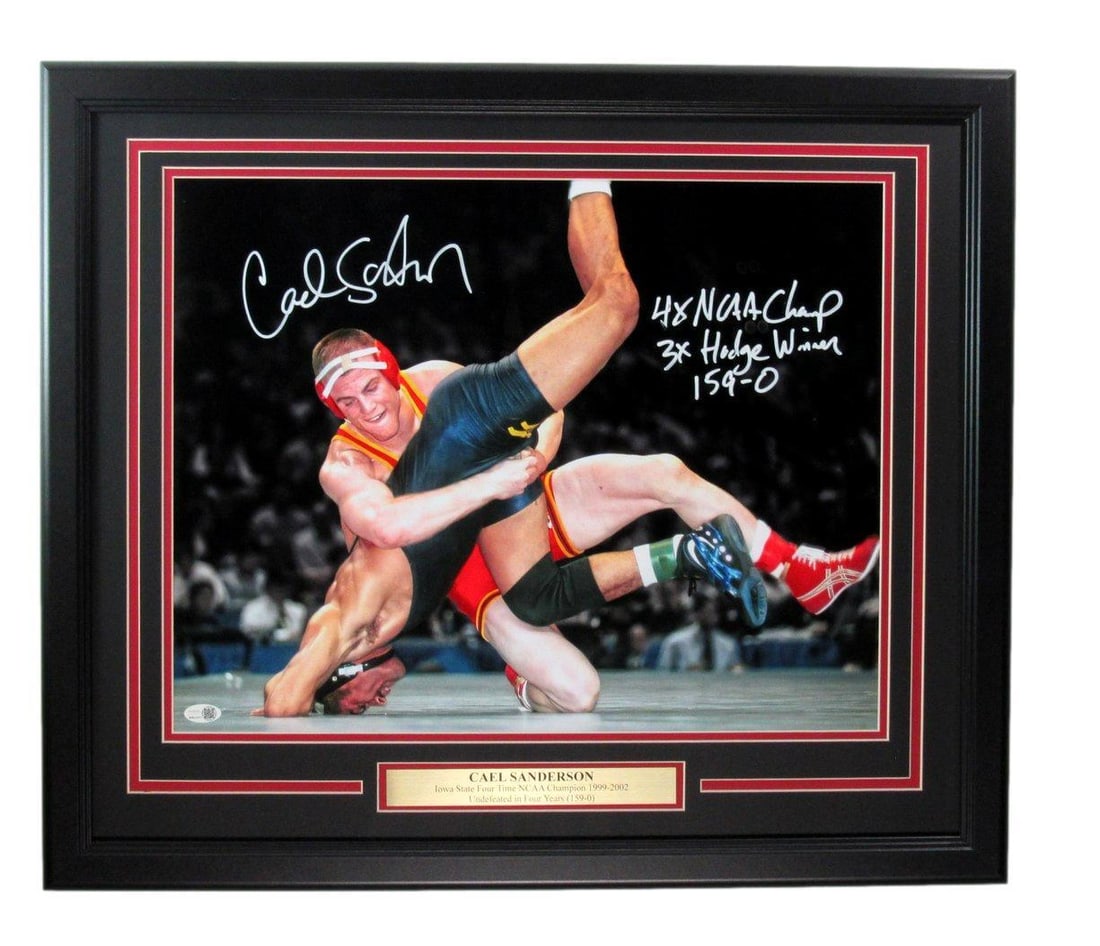 Cael Sanderson Signed 16x20 Framed Iowa State Photo JSA Authenticated: Cael Sanderson Signed 16x20 Framed Iowa State Photo JSA Authenticated This stunning 16x20 framed photo features the signature of Cael Sanderson, an iconic figure in wrestling history. The photo celebr