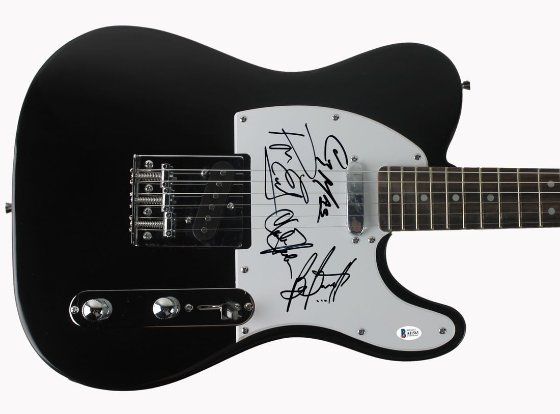 Foghat Signed Huntington Pro Electric Guitar BAS A11563: Foghat Signed Huntington Pro Electric Guitar BAS A11563 This authentic Huntington Pro Electric Guitar is a must-have for any Foghat fan, featuring signatures from all four members: Roger Earl, Charlie