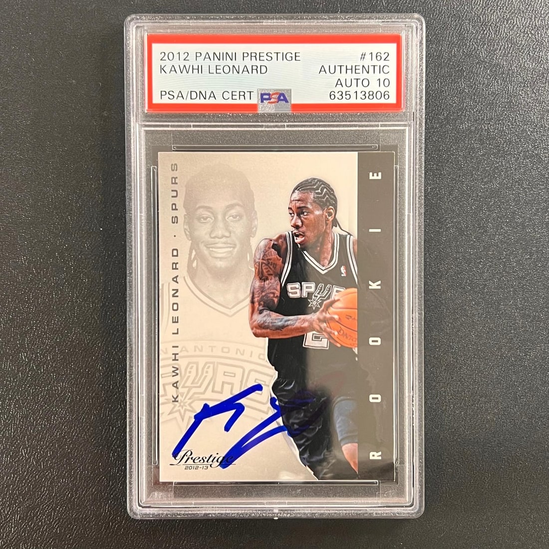 Kawhi Leonard 2012 Panini Prestige 162 Rookie Auto Card PSA Authenticated: Kawhi Leonard 2012 Panini Prestige 162 Rookie Auto Card PSA Authenticated This is a 2012 Panini Prestige rookie sports trading card featuring Kawhi Leonard of the San Antonio Spurs. The card is signed