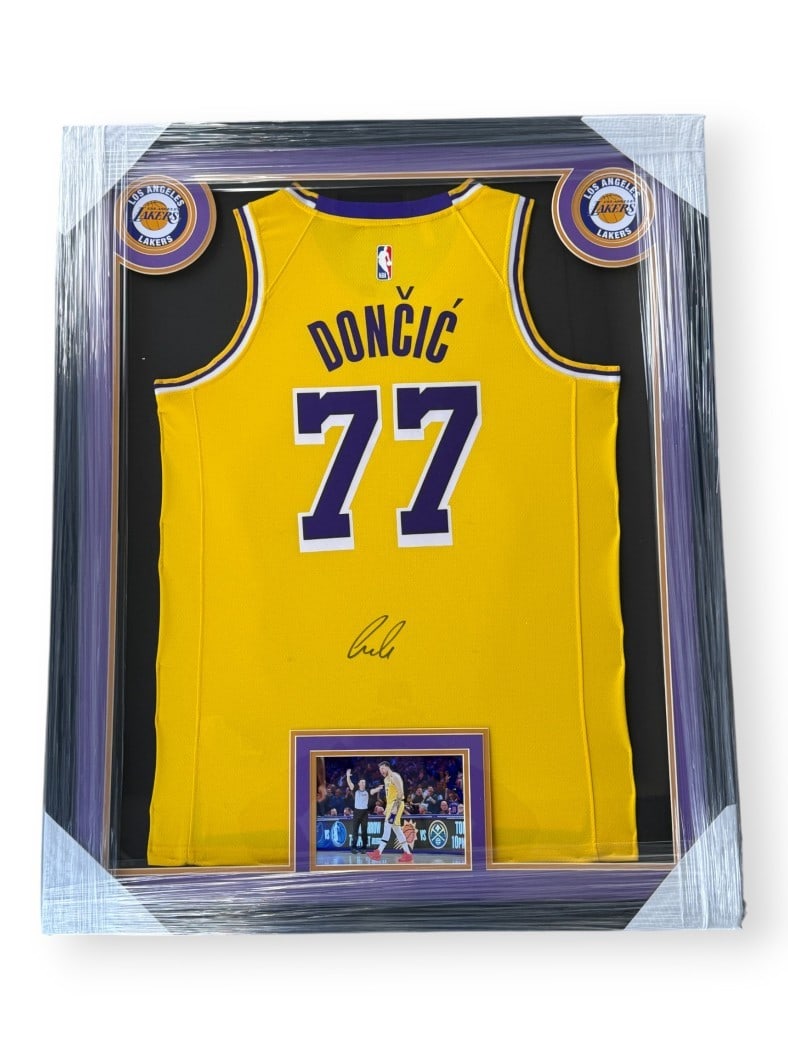 Luka Doncic Autographed Lakers Yellow Jersey Framed With JSA Authentication and Photo: Luka Doncic Autographed Lakers Yellow Jersey Framed With JSA Authentication and Photo This custom framed yellow jersey features the autograph of Luka Doncic and represents the Los Angeles Lakers. The 