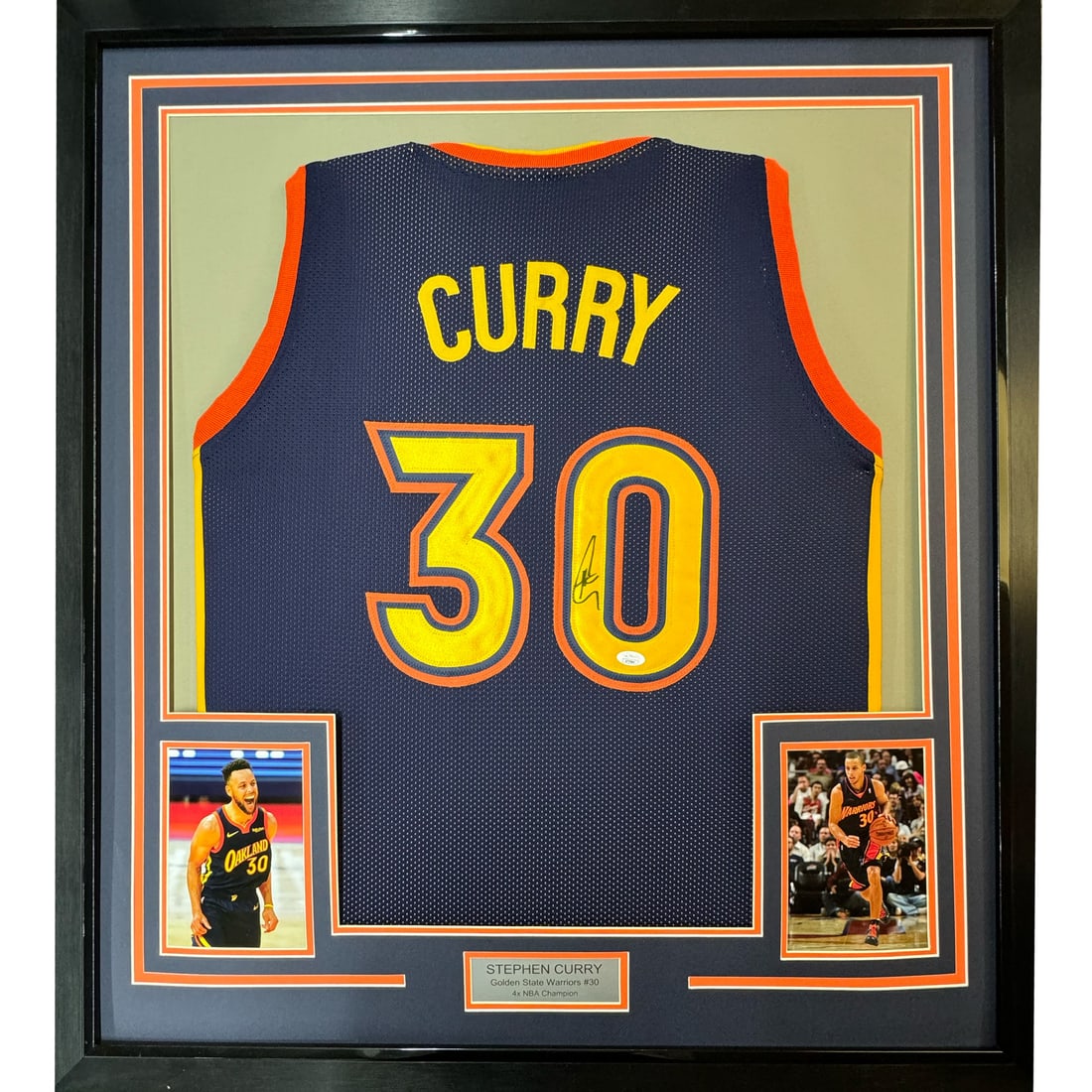 Framed Autographed Stephen Curry Navy Retro Jersey JSA COA 35x39: Framed Autographed Stephen Curry Navy Retro Jersey JSA COA 35x39 Celebrate your love for basketball with this professionally framed and matted autographed Stephen Curry retro jersey. Measuring 35x39 i