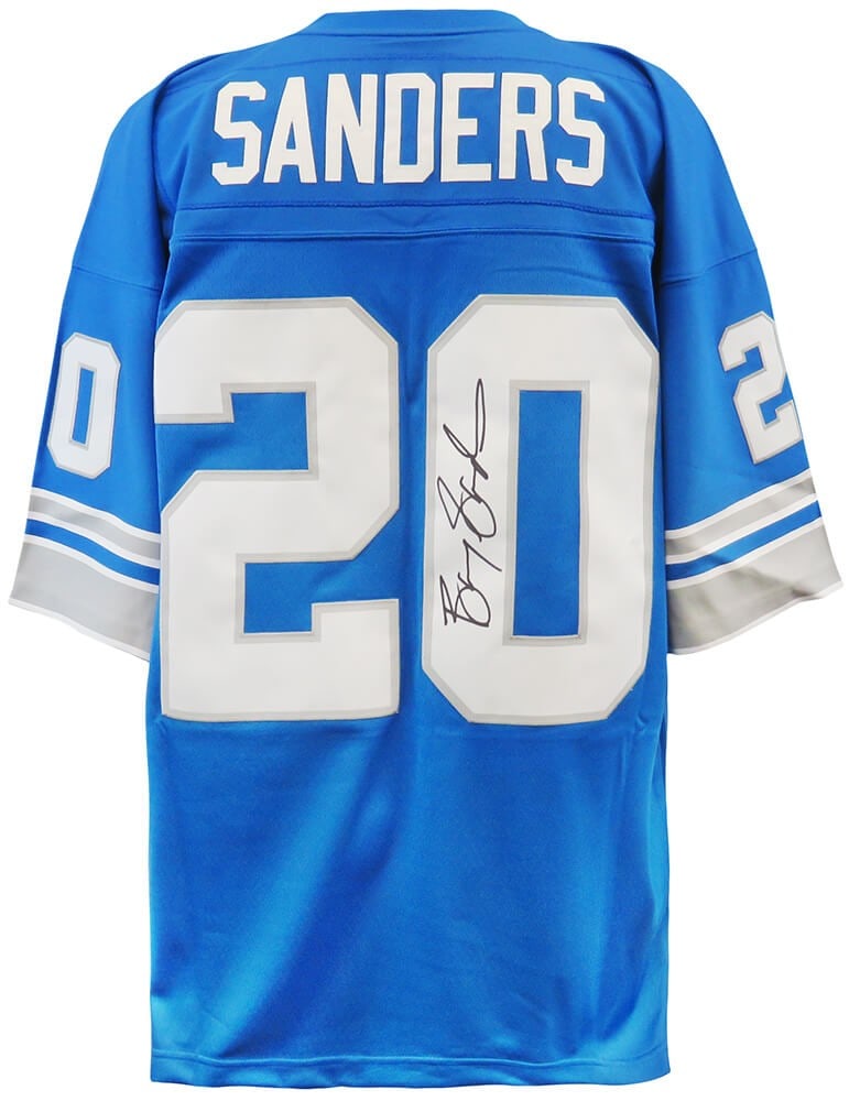 Barry Sanders Signed 1996 Lions Blue Mitchell & Ness Jersey with COA: Barry Sanders Signed 1996 Lions Blue Mitchell & Ness Jersey with COA Celebrate the legacy of Barry Sanders with this signed Detroit Lions blue 1996 throwback Mitchell & Ness NFL Legacy football jersey