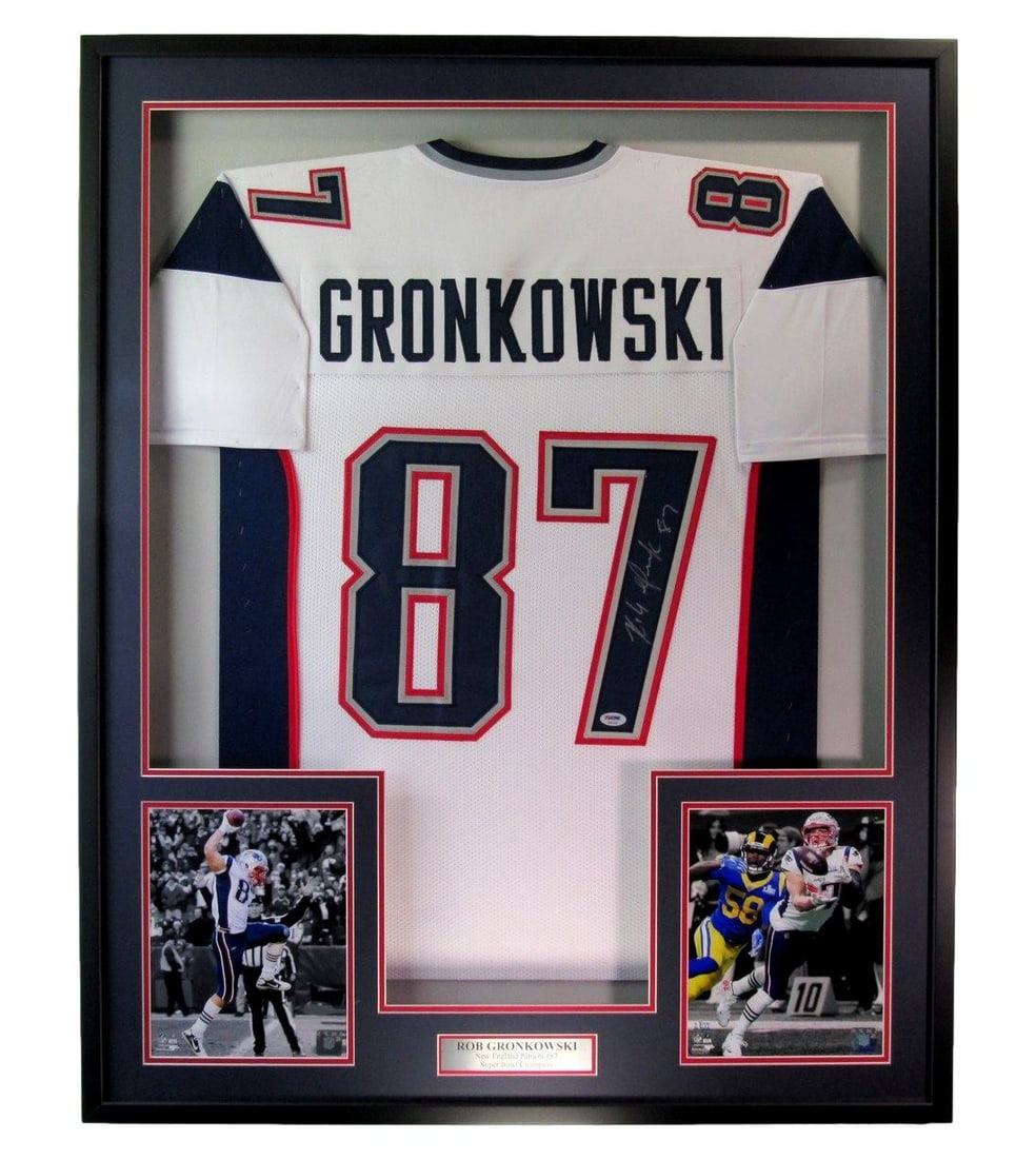 Rob Gronkowski Signed Patriots Jersey Framed PSA/DNA 199502: Rob Gronkowski Signed Patriots Jersey Framed PSA/DNA 199502 Offered is a Rob Gronkowski signed football jersey from the New England Patriots, elegantly framed for display. This original jersey is auth