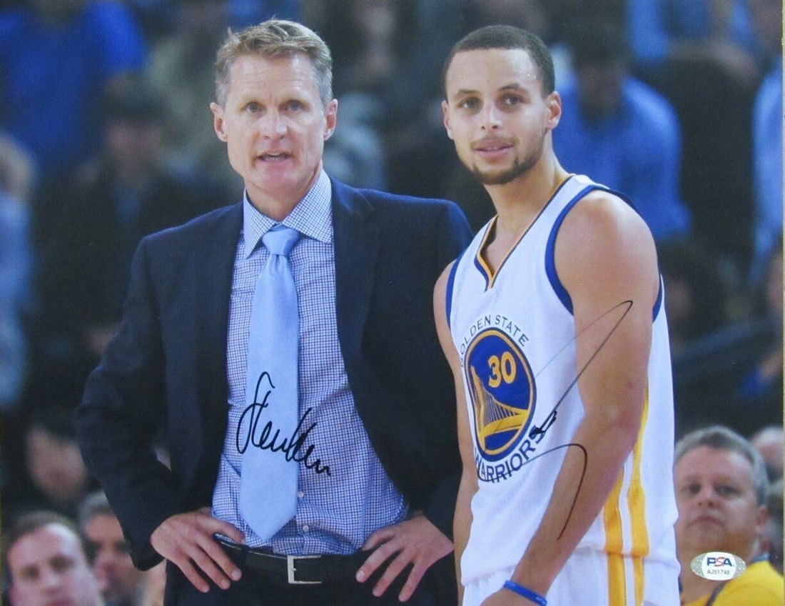 Steph Curry Steve Kerr Dual Signed 11x14 Photo Warriors PSA/DNA: Steph Curry Steve Kerr Dual Signed 11x14 Photo Warriors PSA/DNA This is a striking 11x14 dual-autographed photo featuring Steph Curry and Steve Kerr of the Golden State Warriors. Authenticated by PSA/