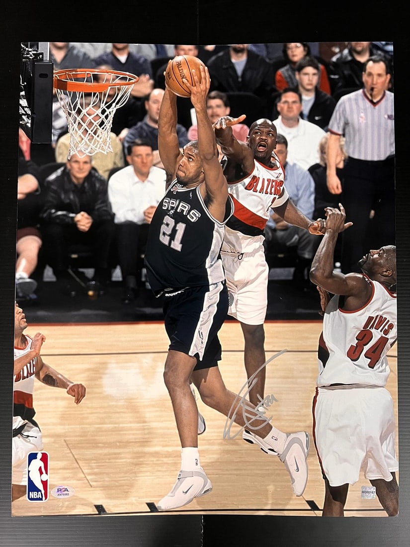 Tim Duncan Autographed 16x20 Photo PSA/DNA San Antonio Spurs: Tim Duncan Autographed 16x20 Photo PSA/DNA San Antonio Spurs This professionally printed 16x20 photograph features the iconic Tim Duncan, a legendary player for the San Antonio Spurs. The photo is aut