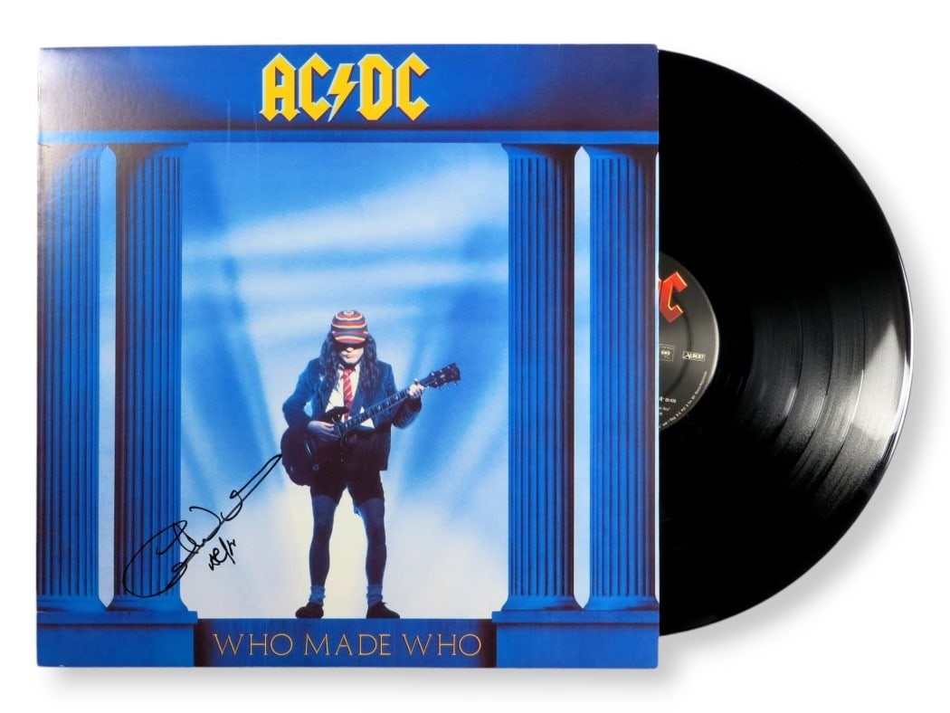 Cliff Williams Autographed AC/DC Record Album Who Made Who Beckett Authenticated: Cliff Williams Autographed AC/DC Record Album Who Made Who Beckett Authenticated This is an original record album signed by Cliff Williams, the bassist of AC/DC, featuring the iconic 'Who Made Who' ti