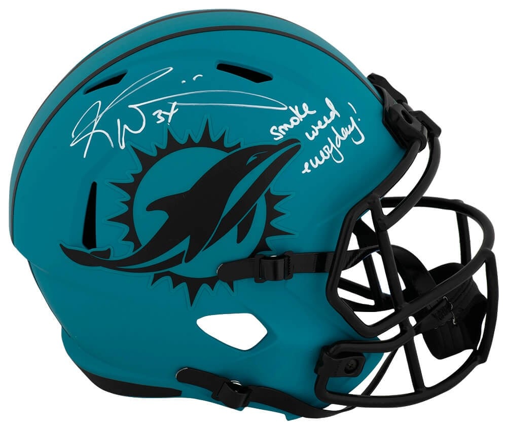 Ricky Williams Signed Dolphins Riddell Helmet with Smoke Inscription - SS COA: Ricky Williams Signed Dolphins Riddell Helmet with Smoke Inscription - SS COA This is a full-size replica helmet of Ricky Williams, featuring a striking design of the Miami Dolphins. The helmet is sig
