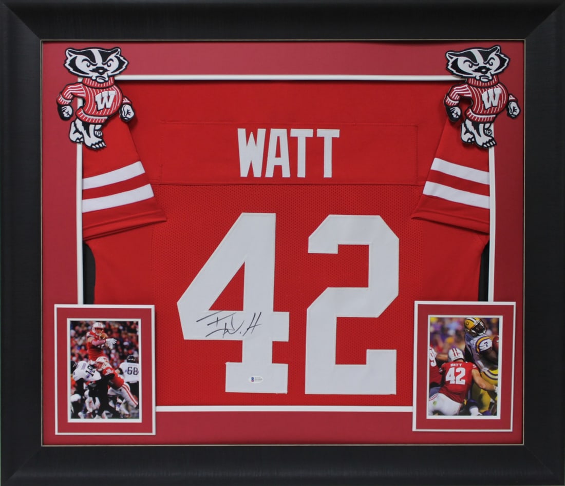 T.J. Watt Signed Wisconsin Badgers Framed Jersey BAS Witnessed 32 x 37: T.J. Watt Signed Wisconsin Badgers Framed Jersey BAS Witnessed 32 x 37 This authentic signed red pro style framed jersey features the iconic autograph of T.J. Watt, a prominent player from the Wiscons