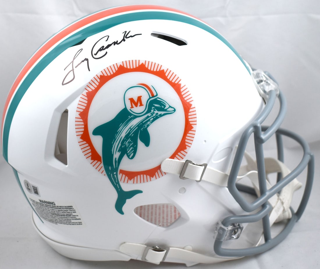 Miami Dolphins authentic helmet signed by Larry Csonka Beckett W Holo: Miami Dolphins authentic helmet signed by Larry Csonka Beckett W Holo This is an original Miami Dolphins full-size Speed Authentic helmet signed by Larry Csonka. The helmet is associated with the 1972