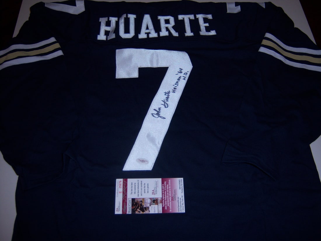 Signed John Huarte Navy Notre Dame Jersey Heisman JSA COA: Signed John Huarte Navy Notre Dame Jersey Heisman JSA COA This pre-owned navy blue Notre Dame Fighting Irish jersey features the number 7 and is signed by John Huarte, the Heisman Trophy winner. The j