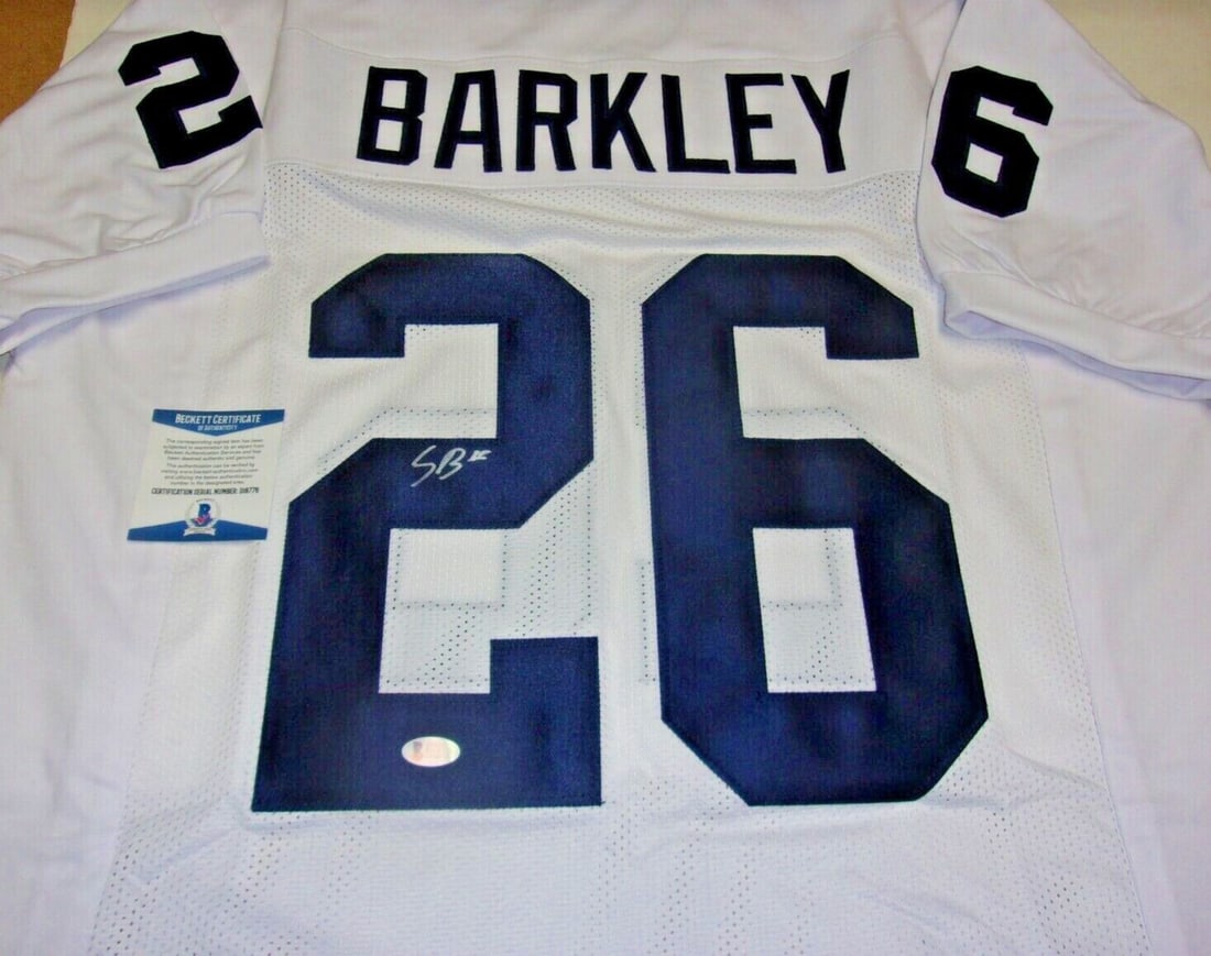 Saquon Barkley Signed Penn State Nittany Lions Jersey with Beckett Certification: Saquon Barkley Signed Penn State Nittany Lions Jersey with Beckett Certification This authentic jersey features the signature of Saquon Barkley, a standout player for the Penn State Nittany Lions. The