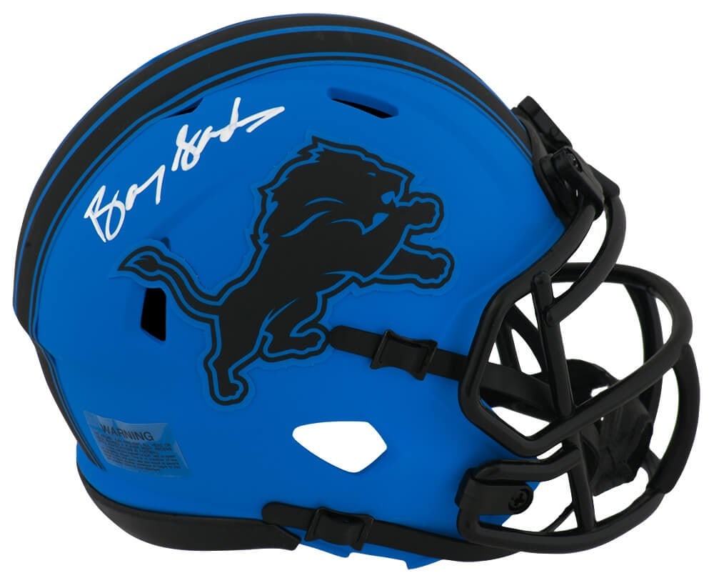 Barry Sanders Signed Lions RAVE Riddell Mini Helmet with COA: Barry Sanders Signed Lions RAVE Riddell Mini Helmet with COA This collectible features a Barry Sanders signed Detroit Lions RAVE alternate Riddell speed mini helmet. The helmet is an original piece, a