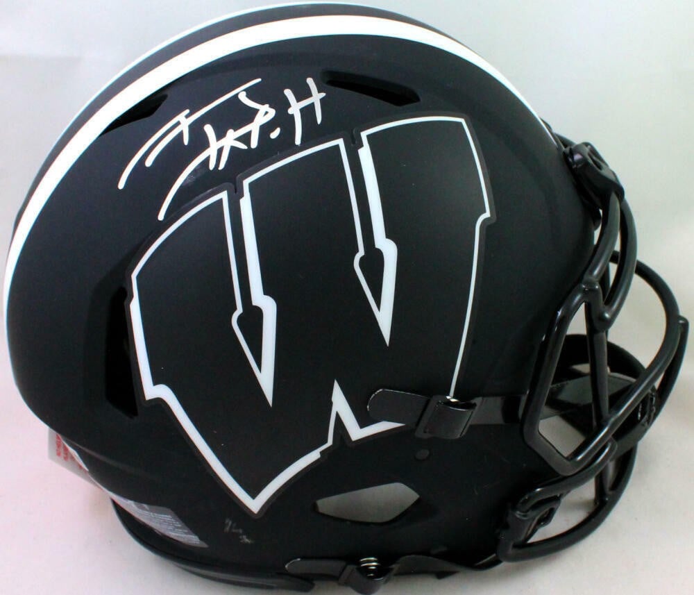 Wisconsin Badgers T.J. Watt autographed Eclipse Speed helmet Beckett: Wisconsin Badgers T.J. Watt autographed Eclipse Speed helmet Beckett This is an authentic full-size Eclipse Speed helmet signed by T.J. Watt, representing the Wisconsin Badgers. The autograph has been