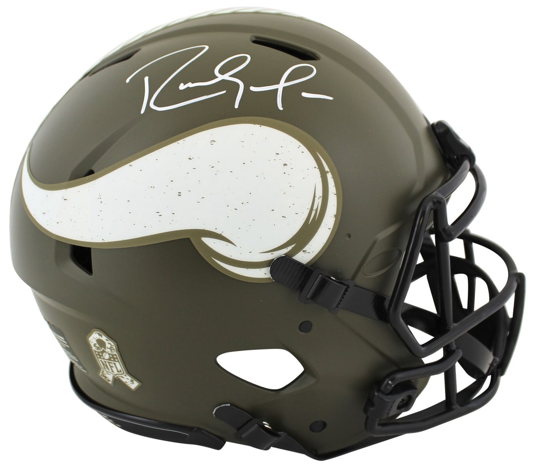 Randy Moss Signed Minnesota Vikings Salute To Service Helmet BAS Witnessed: Randy Moss Signed Minnesota Vikings Salute To Service Helmet BAS Witnessed Celebrate the legacy of Randy Moss with this autographed Minnesota Vikings Salute To Service Full Size Speed Proline Helmet. 