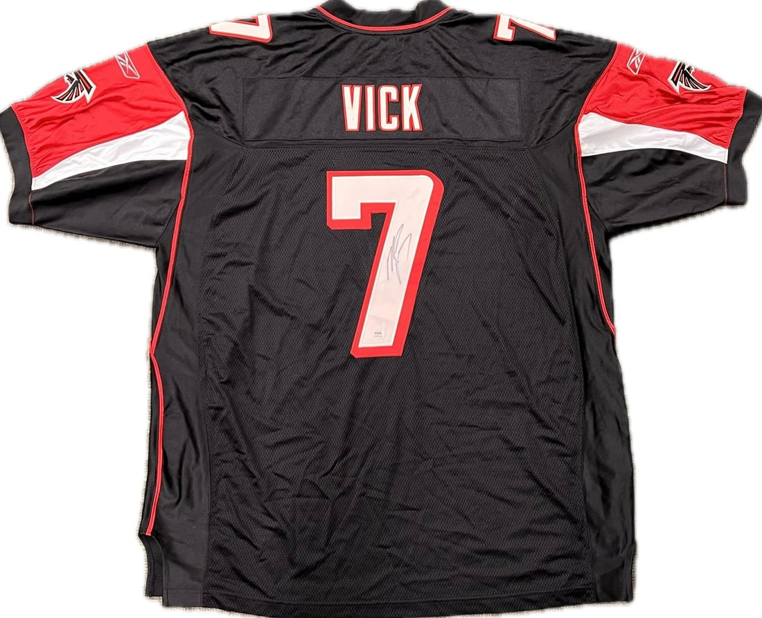 Michael Vick autographed Atlanta Falcons jersey PSA DNA: Michael Vick autographed Atlanta Falcons jersey PSA DNA This is an Atlanta Falcons jersey autographed by Michael Vick. The signature has been authenticated by PSA/DNA, ensuring its authenticity. The j