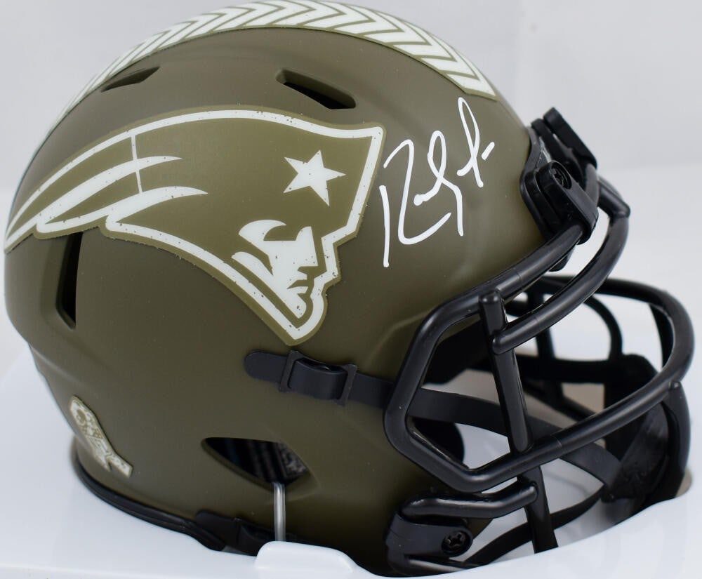 Randy Moss autographed Patriots mini helmet Beckett Holo: Randy Moss autographed Patriots mini helmet Beckett Holo This is a pre-owned New England Patriots Salute to Service Speed mini helmet signed by Randy Moss. The autograph is authenticated by Beckett Au