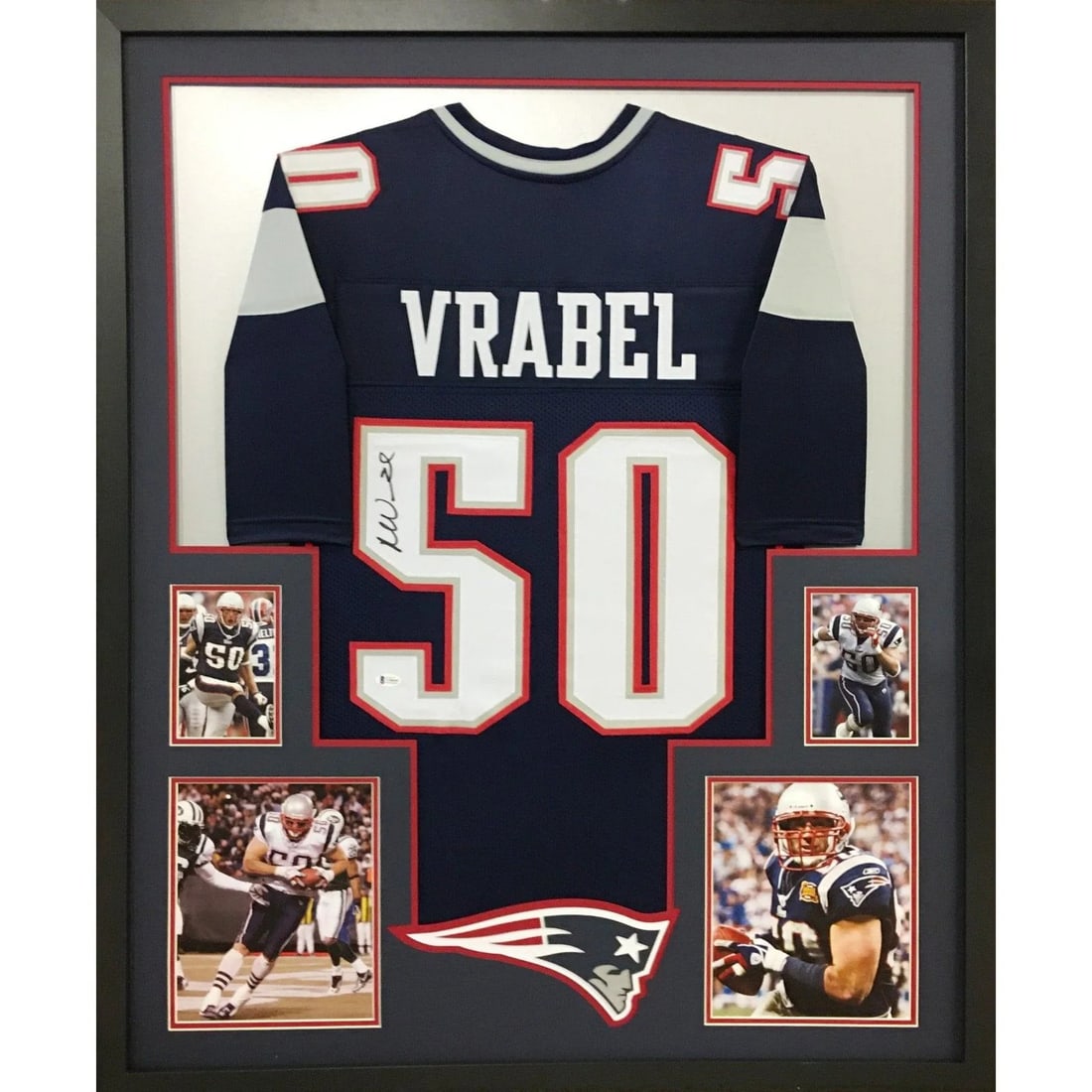Beckett Authenticated Framed Mike Vrabel Patriots Jersey: Beckett Authenticated Framed Mike Vrabel Patriots Jersey This is a framed New England Patriots jersey autographed by Mike Vrabel. The jersey is authenticated by Beckett and includes a tamper-proof sti