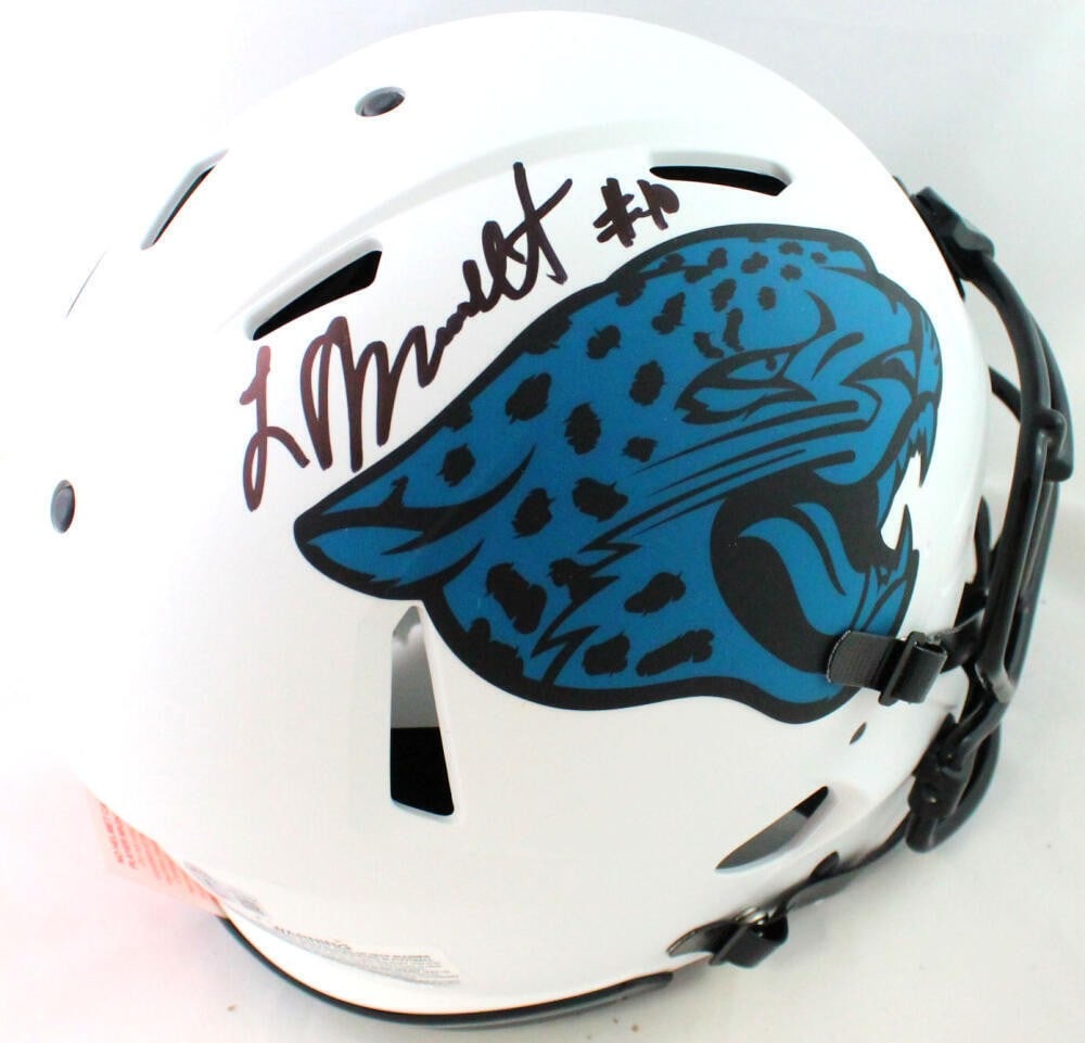 Beckett authenticated Jaguars full size helmet signed by Laviska Shenault: Beckett authenticated Jaguars full size helmet signed by Laviska Shenault This is an authentic Jacksonville Jaguars Lunar Speed full-size helmet signed by Laviska Shenault. The helmet features a bold 