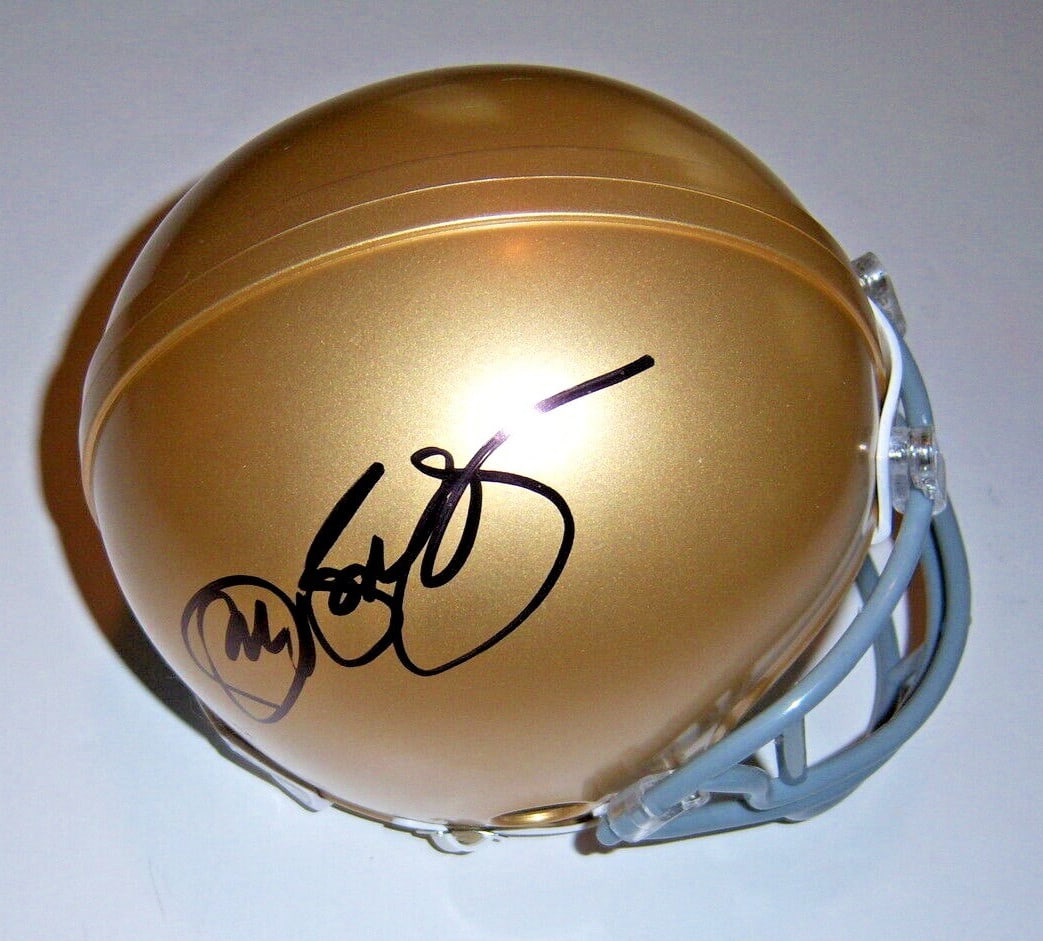 Mini Helmet Signed by Jon Bon Jovi Notre Dame Beckett Certified: Mini Helmet Signed by Jon Bon Jovi Notre Dame Beckett Certified This pre-owned Notre Dame Fighting Irish mini football helmet is signed and comes with Beckett Certificate of Authenticity. It is an ori