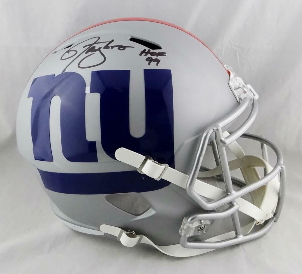 Signed New York Giants AMP Speed Helmet Lawrence Taylor JSA: Signed New York Giants AMP Speed Helmet Lawrence Taylor JSA This is a full-size AMP Speed helmet autographed by Lawrence Taylor, featuring his Hall of Fame inscription. The helmet represents the New Y
