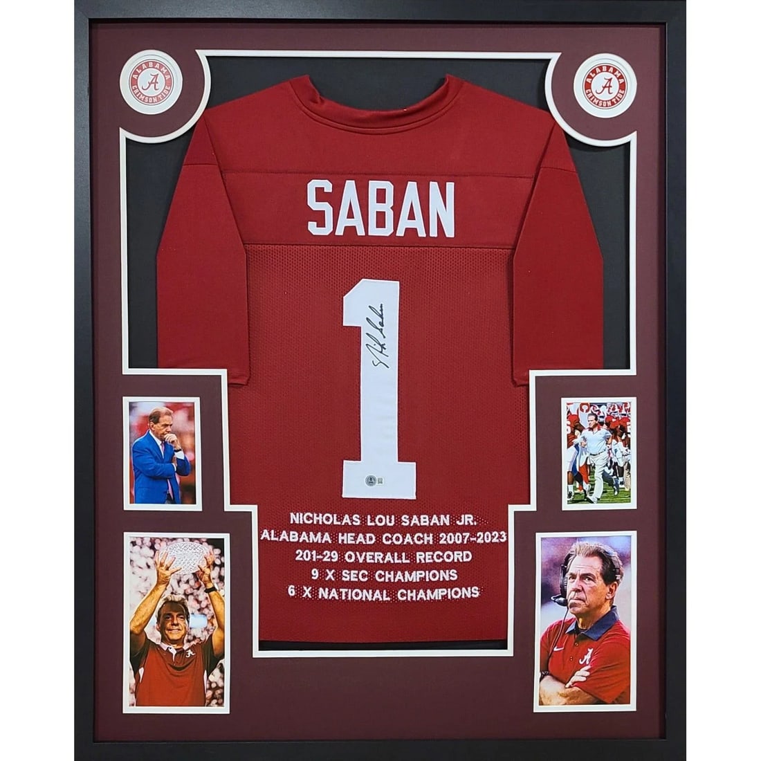 Framed Nick Saban Autographed Alabama Jersey Beckett Authenticated: Framed Nick Saban Autographed Alabama Jersey Beckett Authenticated This framed Alabama jersey is autographed by Nick Saban and features detailed framing with the team's logo. The display is protected 