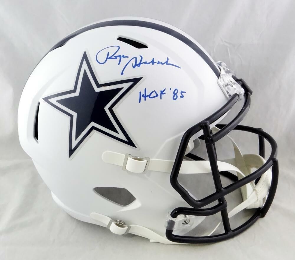 Dallas Cowboys flat white helmet signed by Roger Staubach Beckett authenticated: Dallas Cowboys flat white helmet signed by Roger Staubach Beckett authenticated This is a pre-owned Dallas Cowboys full-size flat white helmet signed by Roger Staubach, featuring an inscription. The a