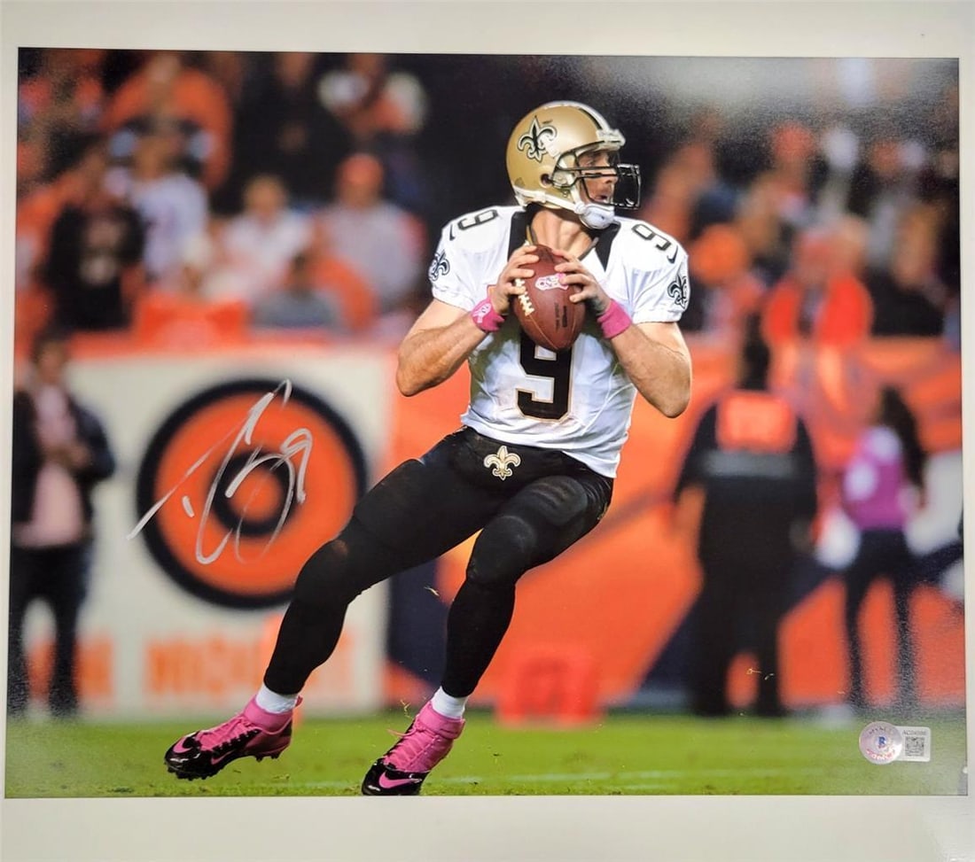 Drew Brees Signed New Orleans Saints 11x14 Photo with BAS Authentication: Drew Brees Signed New Orleans Saints 11x14 Photo with BAS Authentication This striking 11x14 photo features the legendary Drew Brees, a celebrated quarterback of the New Orleans Saints. The photo is a