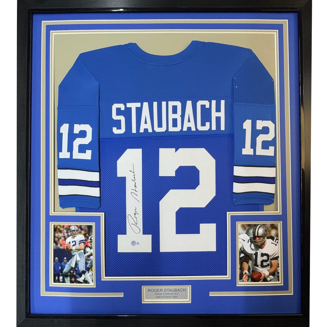 Roger Staubach Signed Dallas Cowboys Blue Jersey Framed Display 35x39 BAS COA: Roger Staubach Signed Dallas Cowboys Blue Jersey Framed Display 35x39 BAS COA This framed Dallas Cowboys blue jersey features the authentic signature of Roger Staubach. The jersey is professionally fr