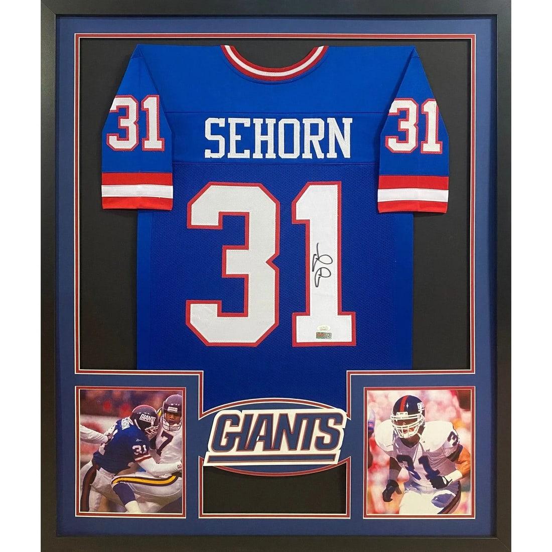 Framed Jason Sehorn Autographed Giants Jersey with JSA Authentication: Framed Jason Sehorn Autographed Giants Jersey with JSA Authentication This framed Jason Sehorn New York Giants jersey features his authentic signature and is professionally authenticated by JSA. The d
