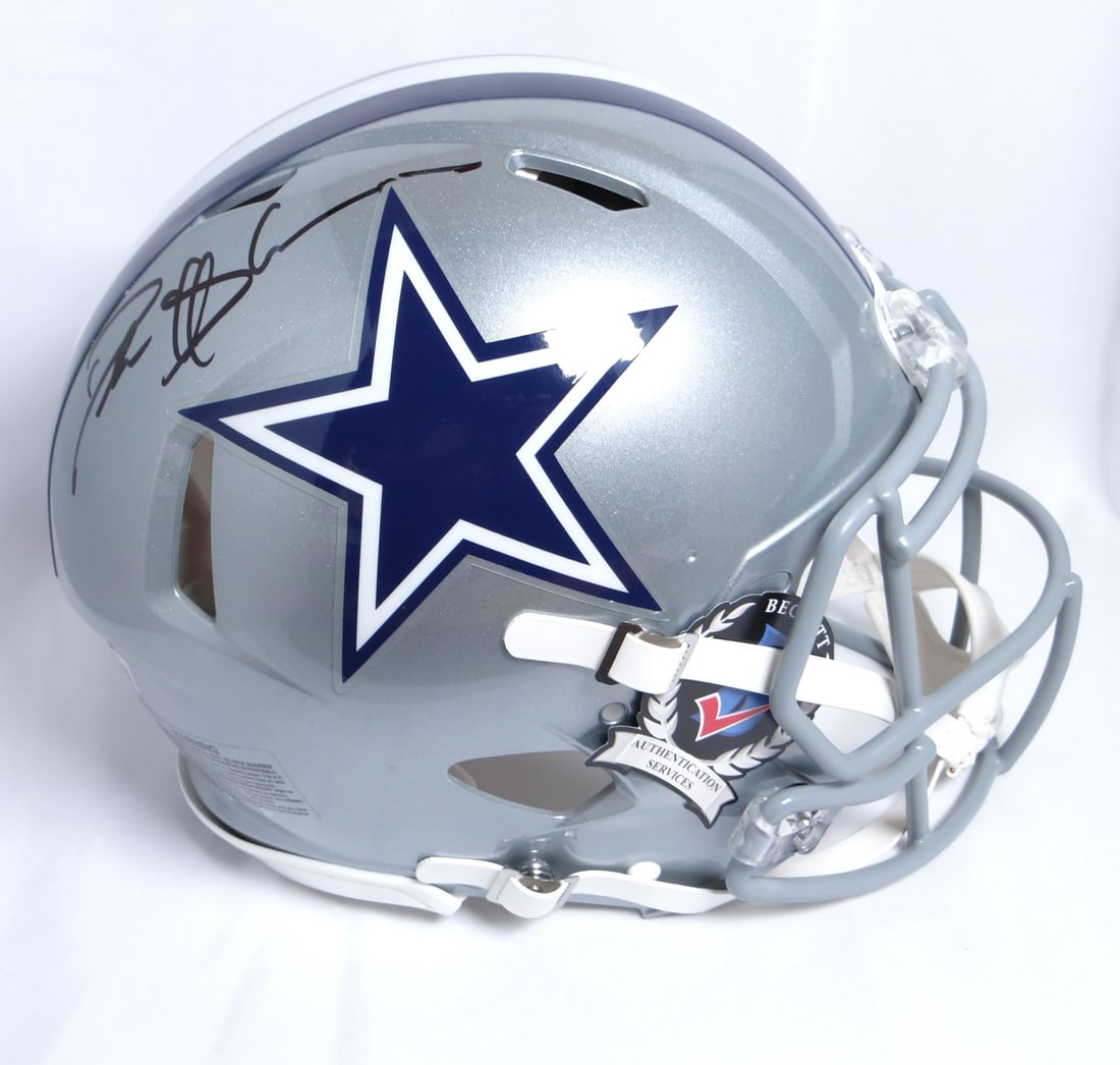 Dallas Cowboys Full Size Authentic Helmet Signed by Deion Sanders Beckett Authenticated: Dallas Cowboys Full Size Authentic Helmet Signed by Deion Sanders Beckett Authenticated This is a Dallas Cowboys full-size Speed Authentic helmet autographed by Deion Sanders. The signature has been a