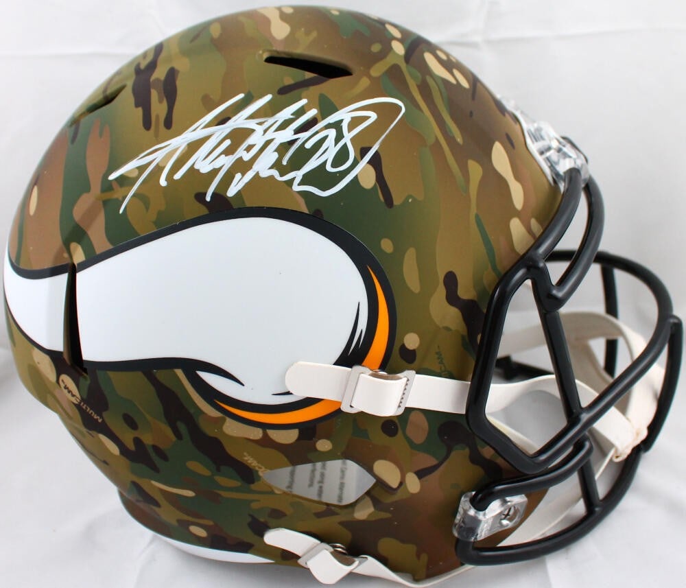 Minnesota Vikings camo speed helmet signed by Adrian Peterson Beckett hologram: Minnesota Vikings camo speed helmet signed by Adrian Peterson Beckett hologram This is a full-size Minnesota Vikings camouflage Speed helmet, personally signed by Adrian Peterson. The helmet comes wit