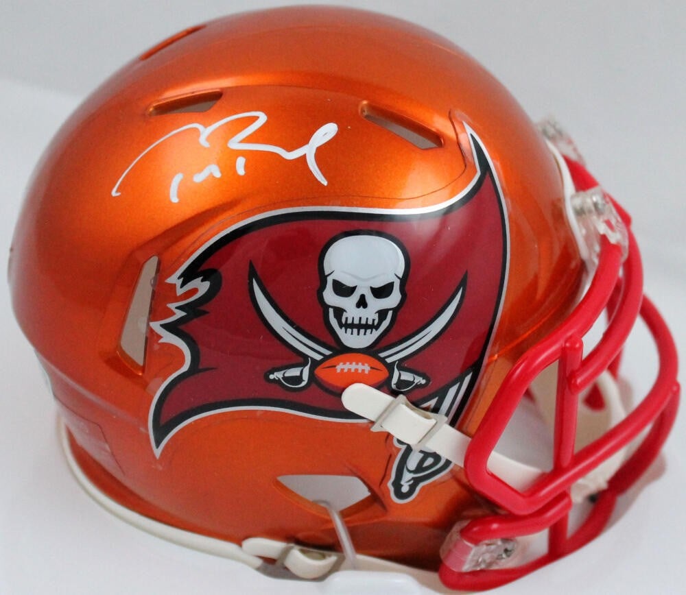 Tampa Bay Buccaneers mini helmet signed by Tom Brady Fanatics LOA: Tampa Bay Buccaneers mini helmet signed by Tom Brady Fanatics LOA This Tampa Bay Buccaneers Flash Speed mini helmet is autographed by Tom Brady. The helmet is an original collectible and comes with au