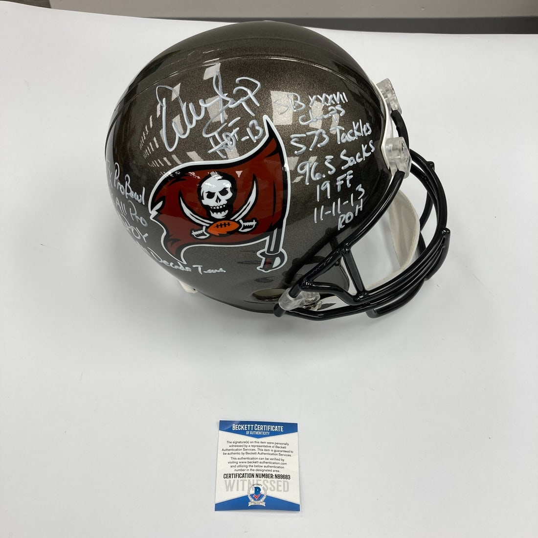 Warren Sapp Signed Tampa Bay Buccaneers Helmet with Beckett Authentication: Warren Sapp Signed Tampa Bay Buccaneers Helmet with Beckett Authentication This is a pre-owned Tampa Bay Buccaneers helmet signed by Warren Sapp, featuring heavily inscribed statistics that highlight 
