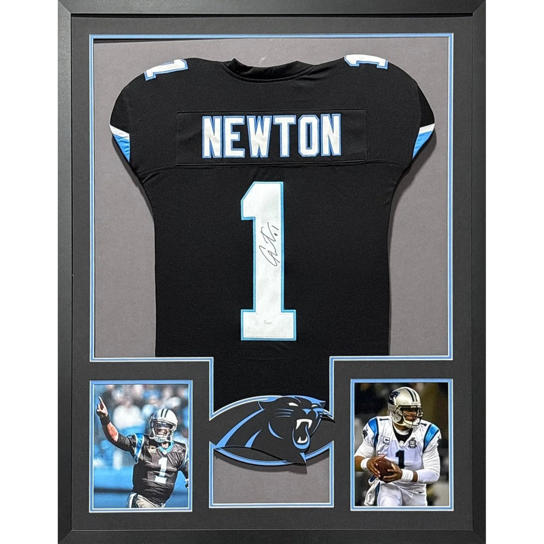 Framed Carolina Panthers Cam Newton Jersey Signed with JSA Authentication: Framed Carolina Panthers Cam Newton Jersey Signed with JSA Authentication This is a framed Carolina Panthers jersey autographed by Cam Newton. The jersey has been authenticated by JSA and includes a t