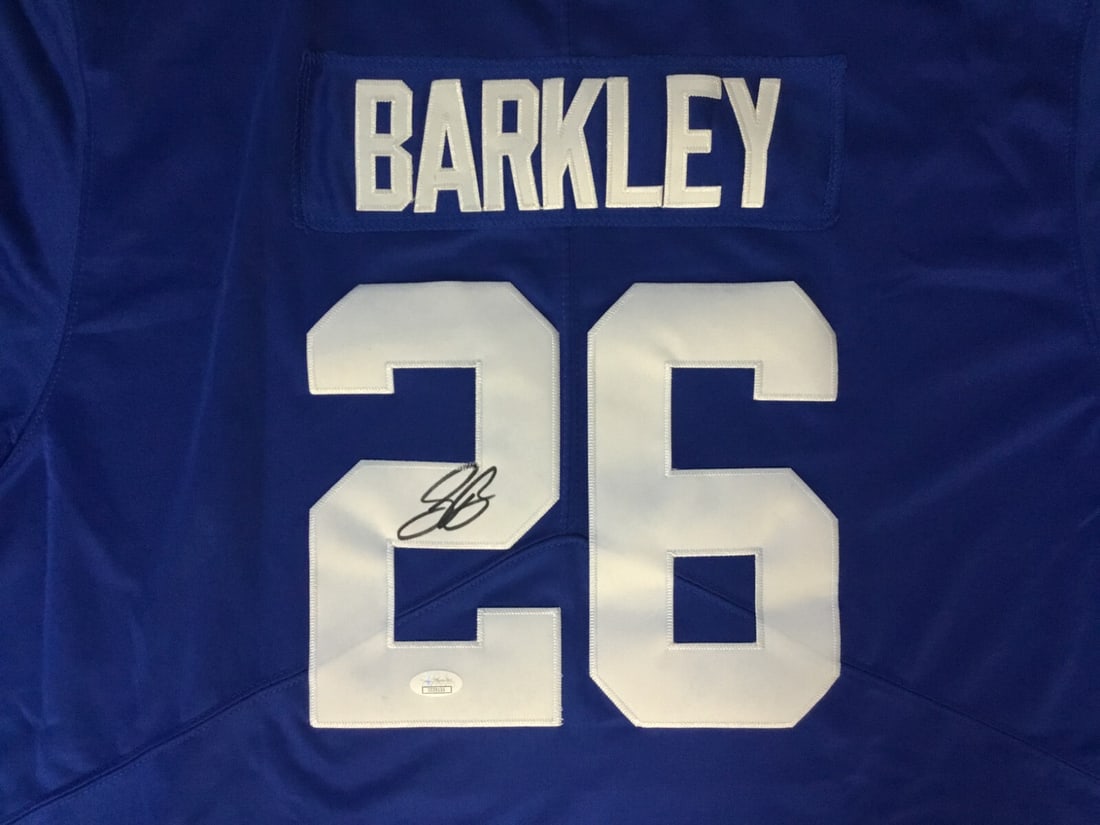 Saquon Barkley Autographed New York Giants Jersey with JSA COA: Saquon Barkley Autographed New York Giants Jersey with JSA COA Celebrate your love for football with this authentic Saquon Barkley autographed New York Giants #26 jersey. This officially licensed jers