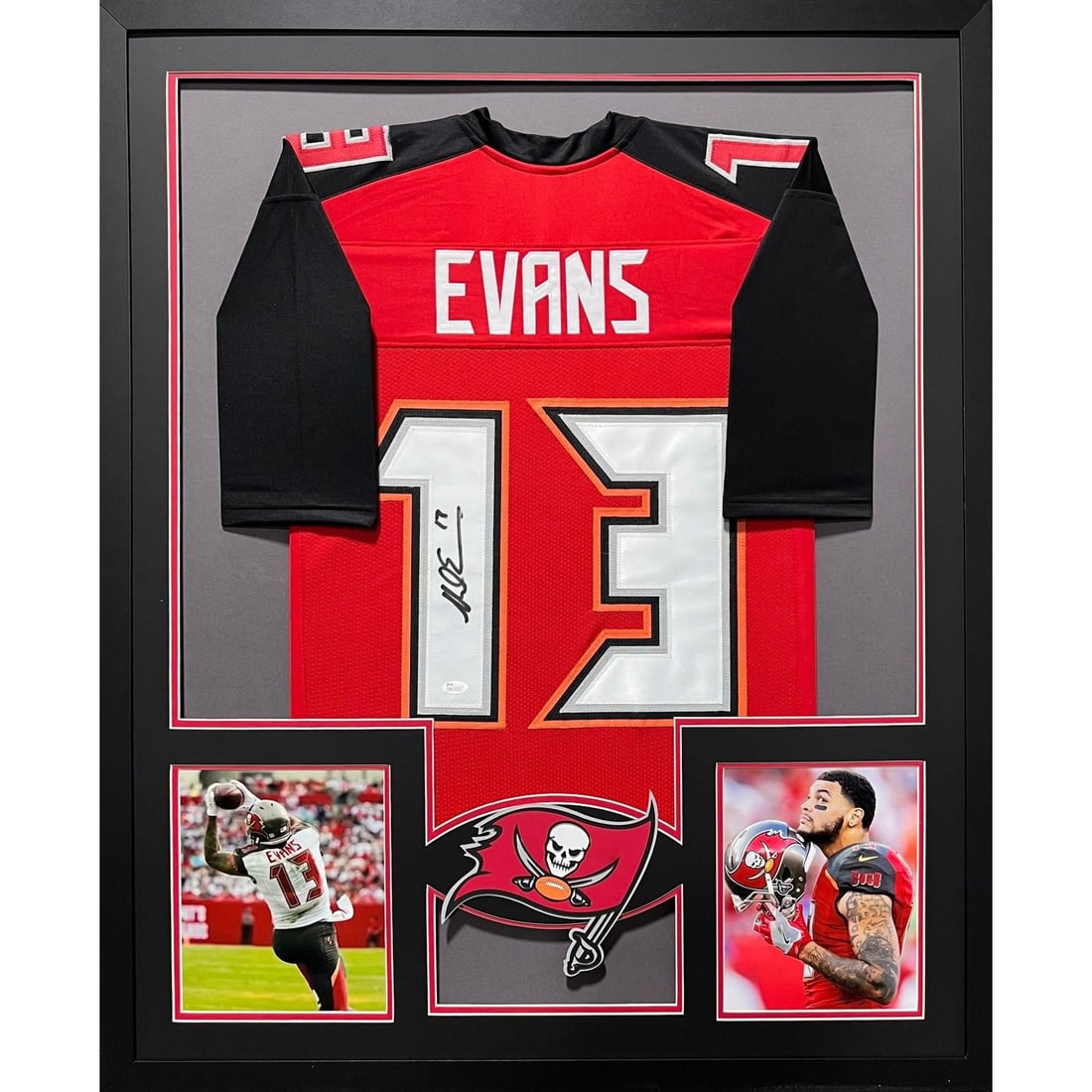 Mike Evans Autographed Framed Jersey Tampa Bay Buccaneers JSA Authentic: Mike Evans Autographed Framed Jersey Tampa Bay Buccaneers JSA Authentic This autographed framed jersey of Mike Evans, a standout player for the Tampa Bay Buccaneers, is an exceptional collectible. Aut
